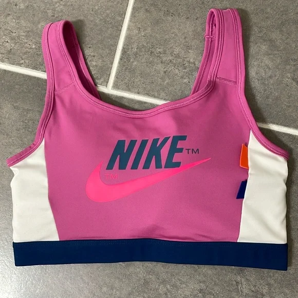 Nike Training Icon Clash logo bra in pink size Large